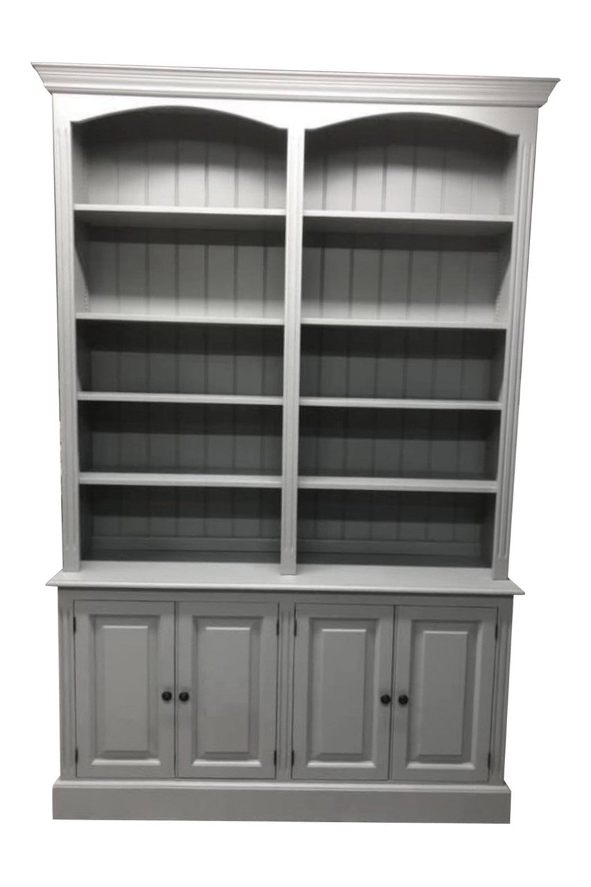 Gray bookshelf with open shelves and closed doors on a white background