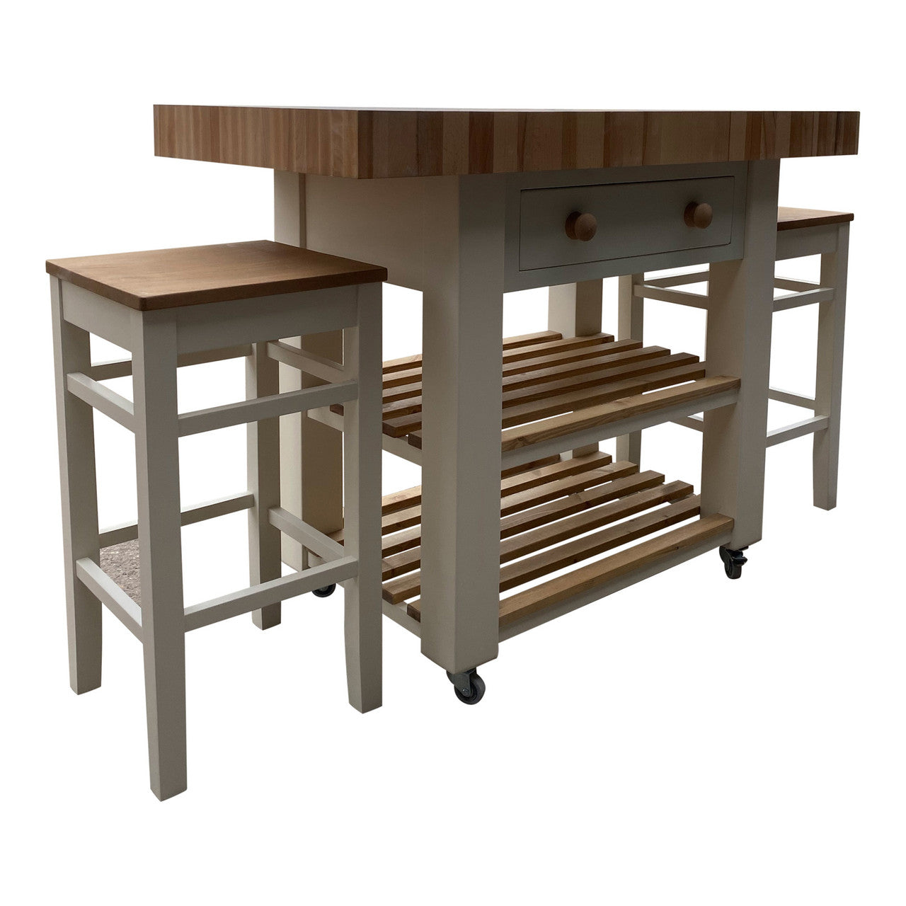 Kitchen island with wooden top and stools on a white background